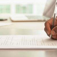 Signing contract close up 1289842165