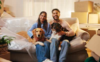 Couple dogs and portrait on sofa in new house for mortgage success security and bonding together night people and happy with animals in first home for relocation property investment or moving in 2652486919