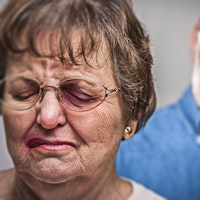 Domestic abuse old couple close up black eye 223555405