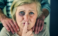 Domestic abuse women close up black eye 194789579