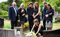 Funeral family grave lay flowqers 1230694315