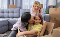 Happy family move into new house cute little girl jump inside box nice child have fun crazy parent play kid joy dad rent home funny mom buy real estate people sale flat young buyer wave hand 2376122651