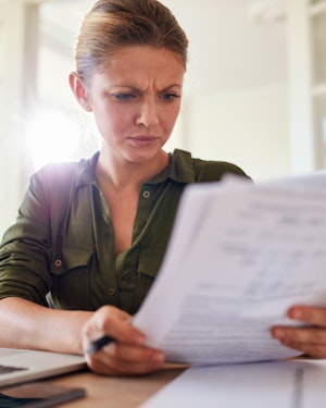 Women unhappy concerned dispute paperwork contract 529543765